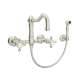 Wall Mount Column Spout Bridge Kitchen Faucet With Sidespray And Cross Handle In Polished Nickel