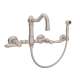Wall Mount Column Spout Bridge Kitchen Faucet With Sidespray And Metal Lever Handle In Satin Nickel